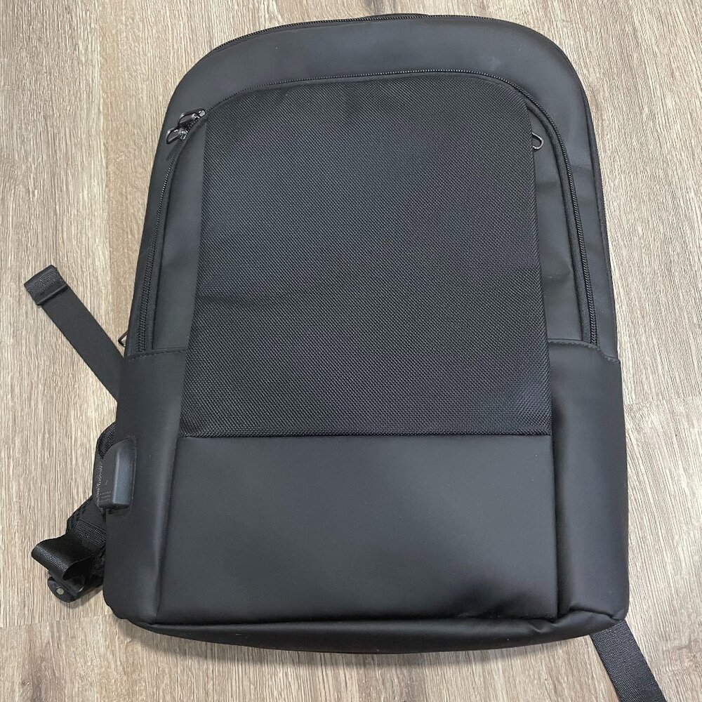 Brand New Laptop backpack Padded Four Zipper Pockets and Usb Hook Up On Side